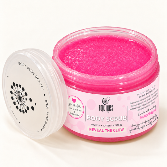 Body Bliss Reveal the Glow glycolic body scrub in a clear jar with its lid beside it.