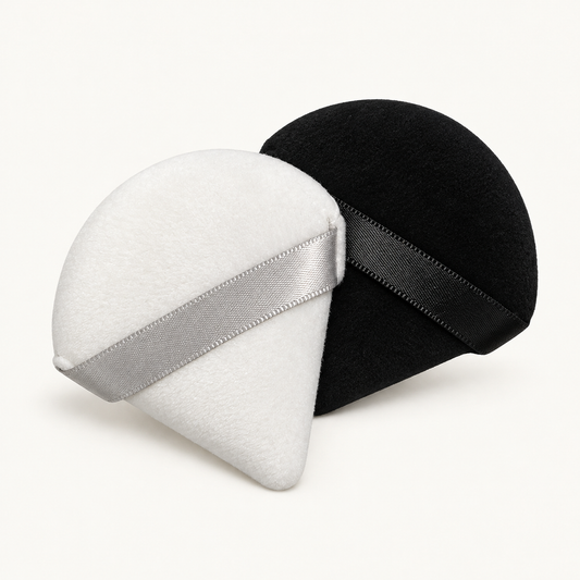 Body Bliss two-pack small makeup blending sponges in black and white on an ivory background