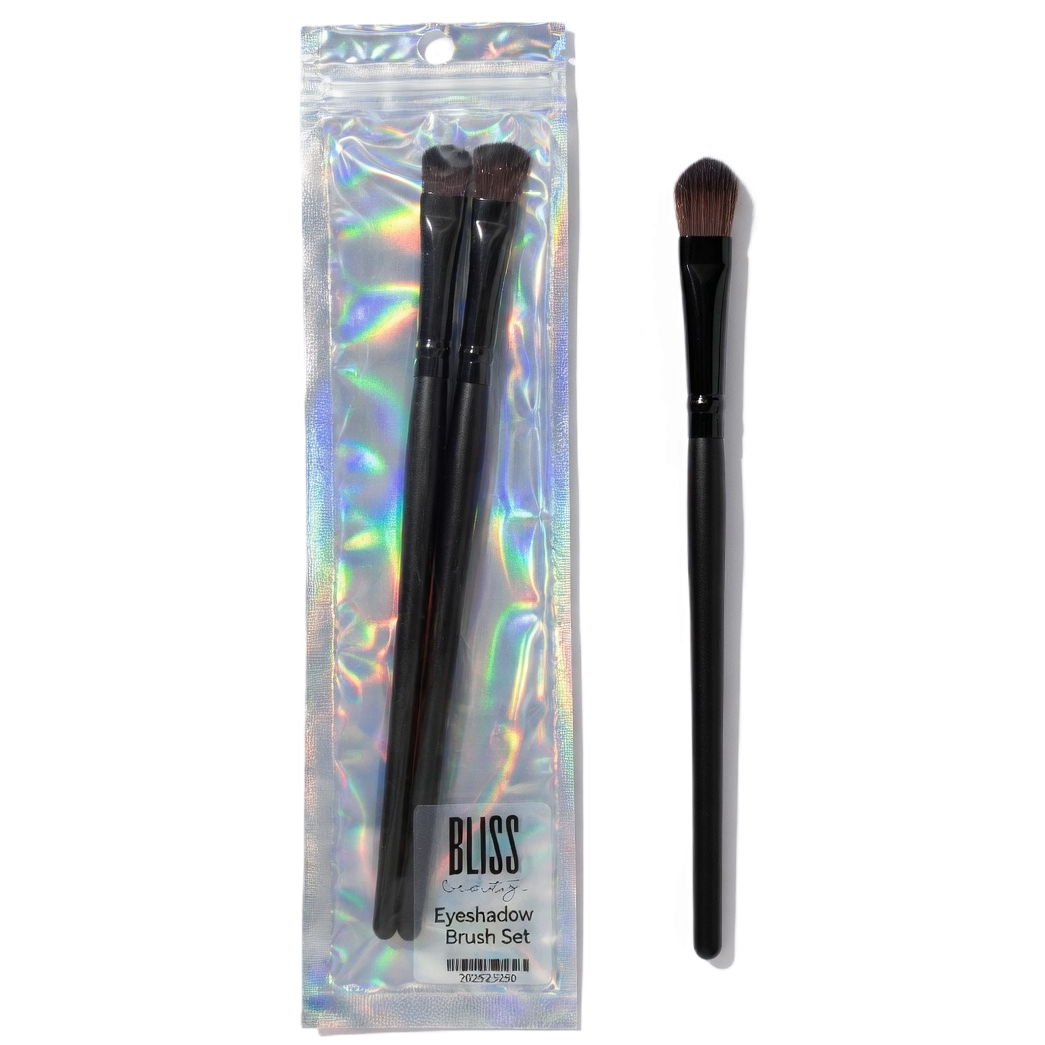 Set of makeup brushes with a 'Bliss' branded packaging on a white background