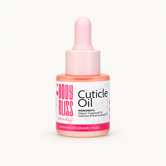 Body Bliss Cuticle Oil on warm ivory background