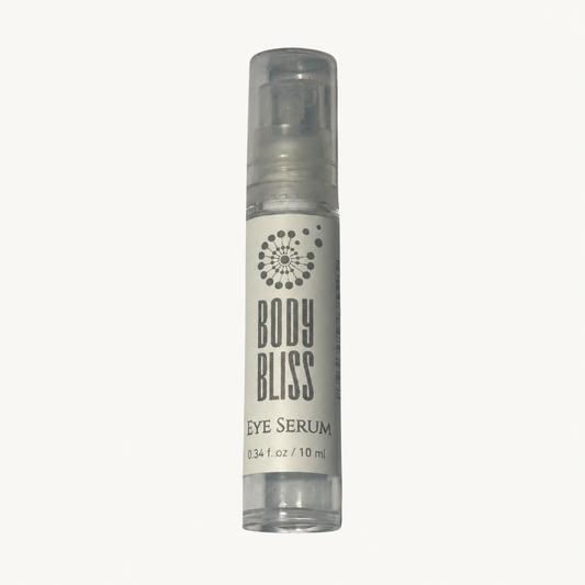 Body Bliss Eye Serum 10 ml pump bottle on a warm ivory background