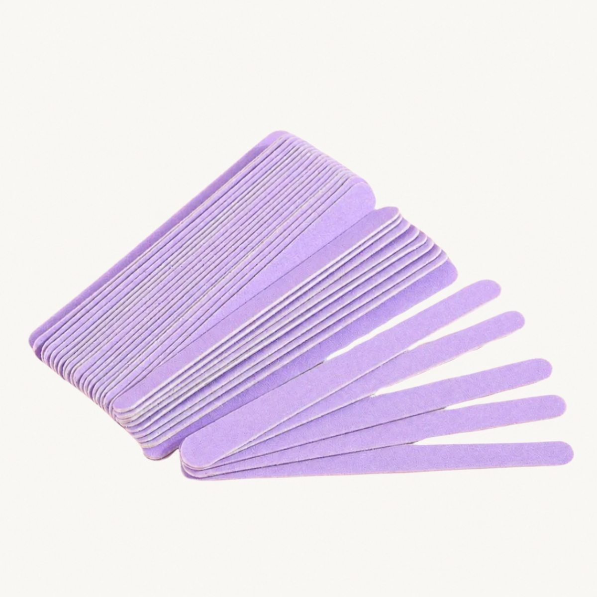 Stacked and fanned lavender Body Bliss nail files on a warm ivory background