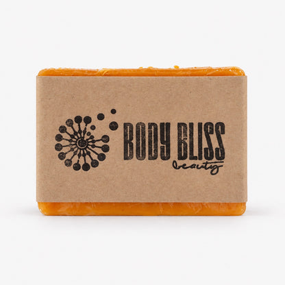 One orange Body Bliss soap bar wrapped in clear film with a kraft-paper sleeve