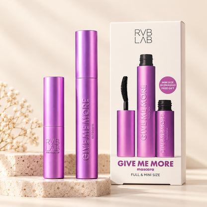 RVB LAB Give Me More full and mini mascara set displayed with its box on warm beige stone plinths